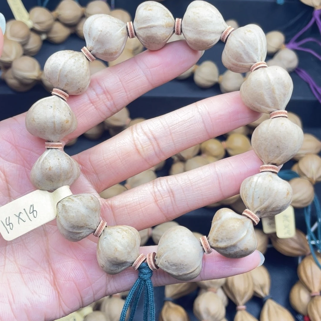 001橄榄核三花蒜头18*18