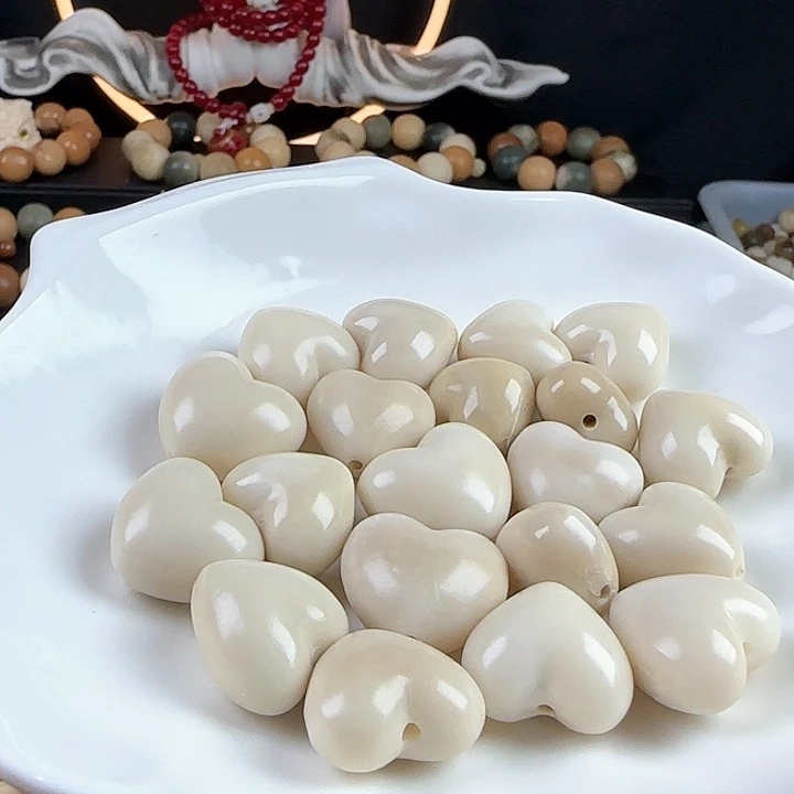 菩提根/象牙果吊坠瑕疵牙果爱心5颗不挑瑕疵有大裂介意勿拍