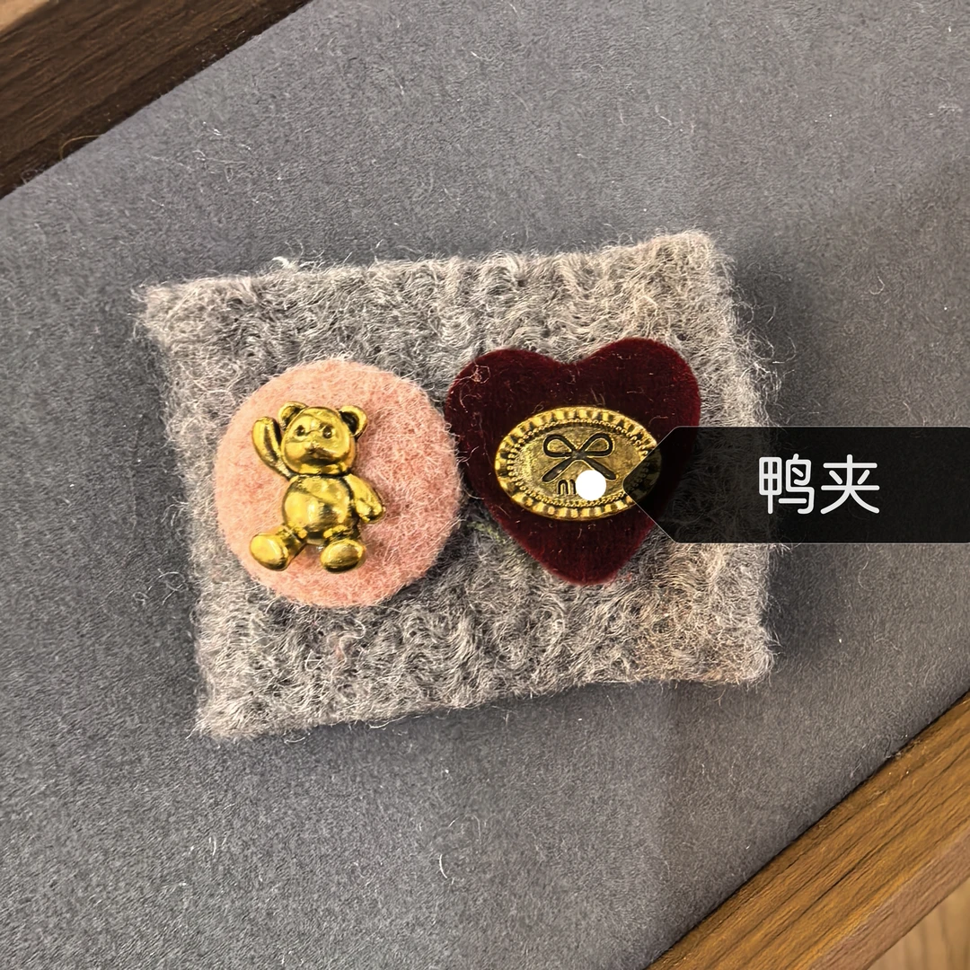 F672金色小熊爱心蝴蝶结毛毛边夹