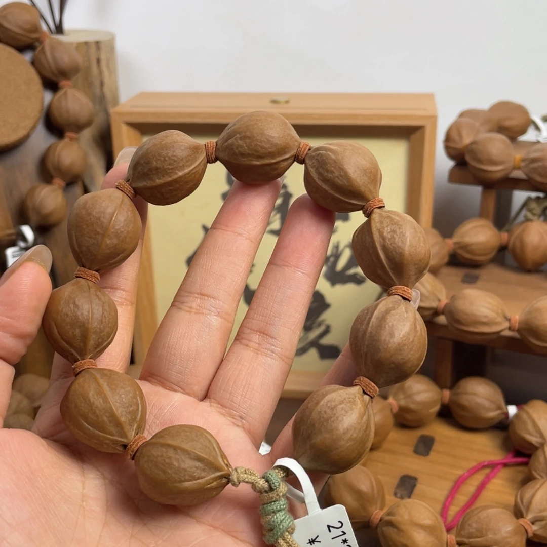 琦***儿手串/手链橄榄核21*26梅林铁核