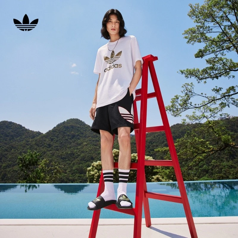 阿迪达斯官方三叶草 居家拼接运动短裤男款 adidas H09357