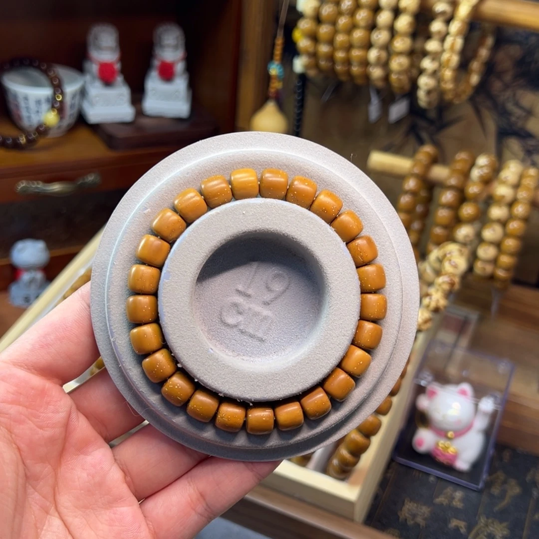 小***冷无非金属紫金鼠9.3*8.4实心黄金甲老型精品
