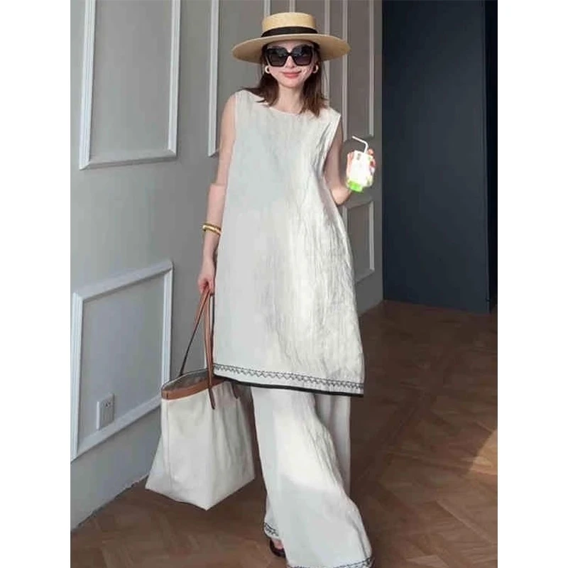 慵懒亚麻套装女休闲无袖廓形背心夏季新款度假风裙叠穿长裤两件套