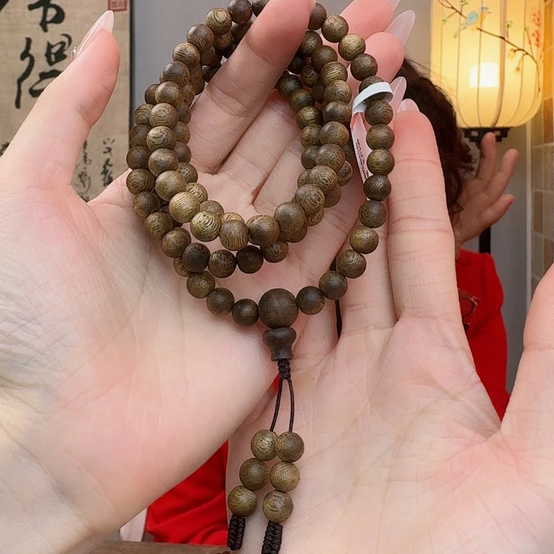 沉香手串海南红谷凹身圆珠0.7*108