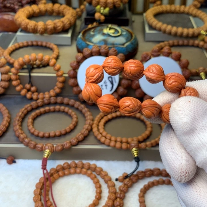 郭***子桃核手串秦岭龙纹