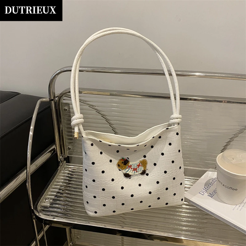 轻奢精致链条手提水桶包包女小众设计洋气高级质感抽带单肩斜挎包