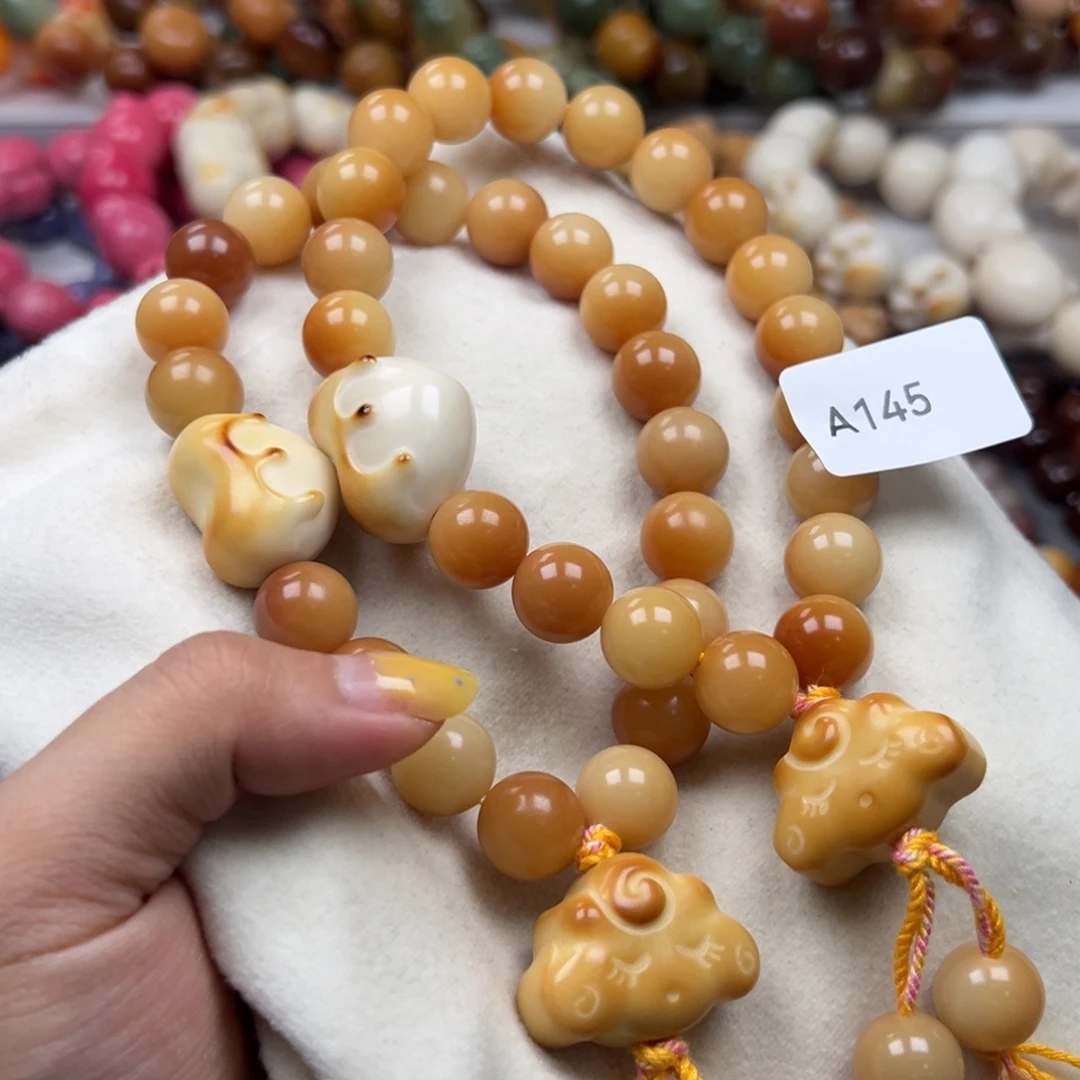 菩提根/象牙果吊坠A145圆珠手持13mm一串通货随机