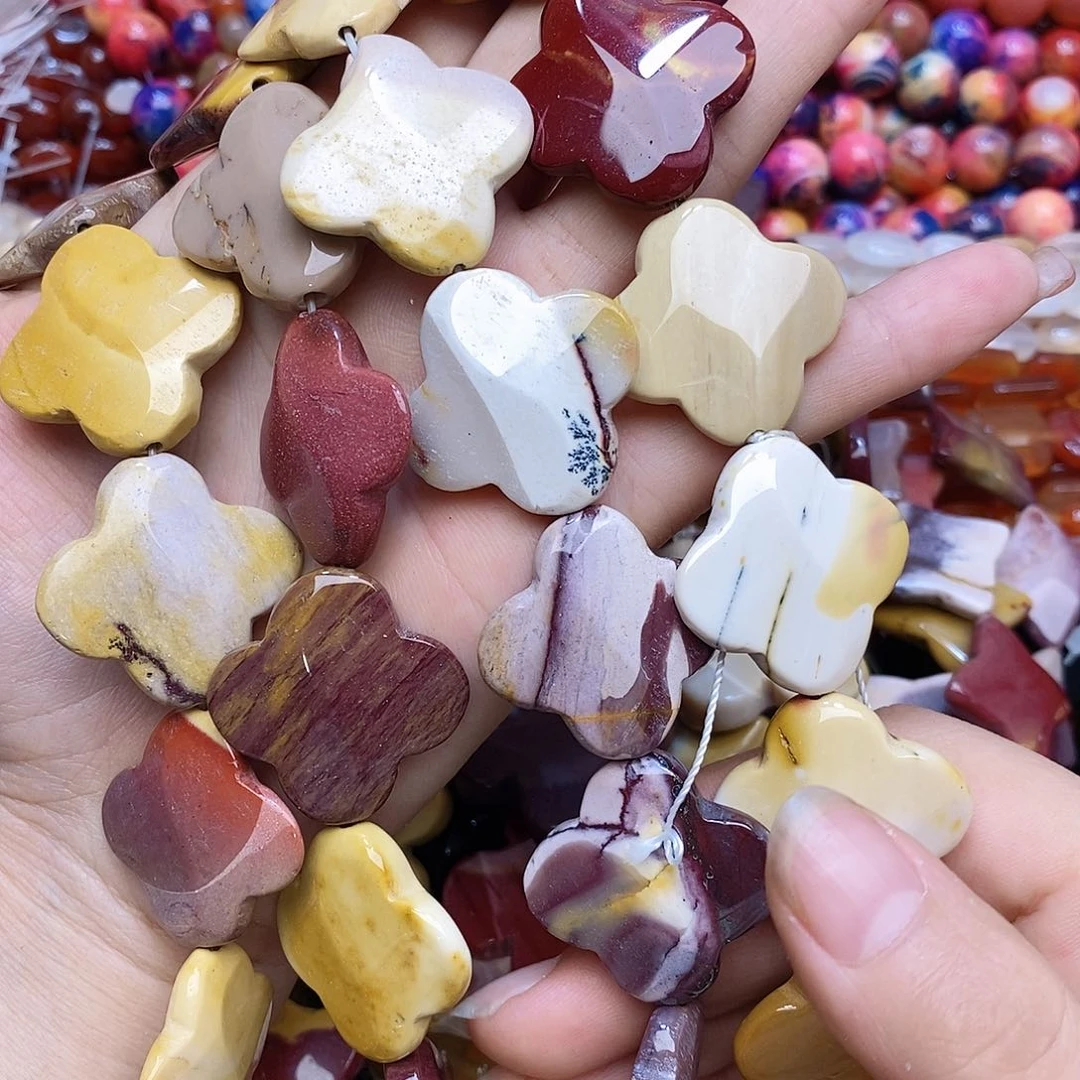 玛瑙/玉髓未镶嵌珠宝半成品蛋黄石花花一条装
