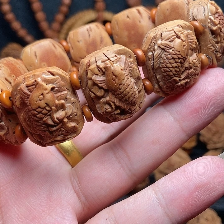 桃核九鲤戏莲手牌