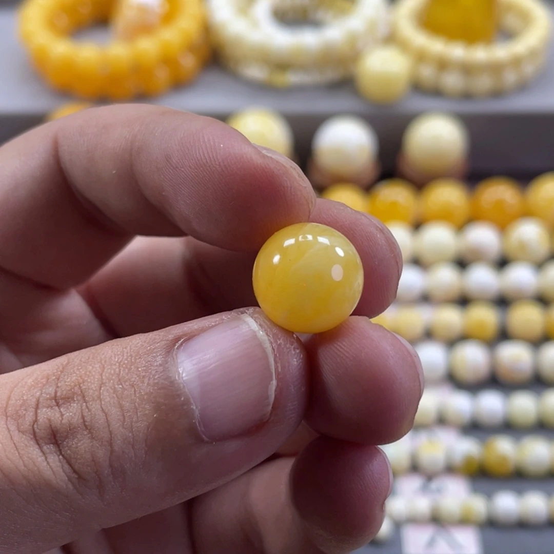 啃***瓜裸石蜜蜡未镶嵌焦皮料白花圆珠