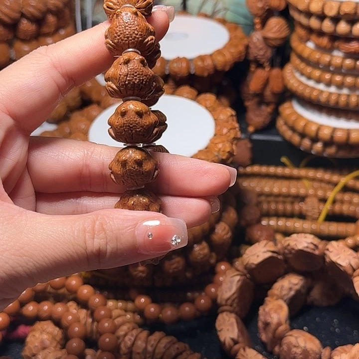 桃核手串呱呱来财