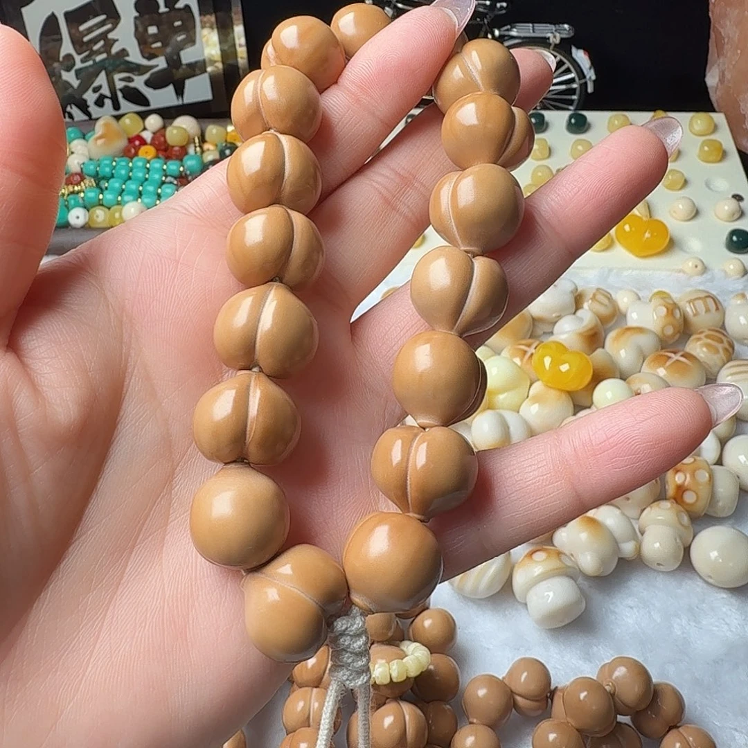 鑫***修猴头核桃手串屁桃