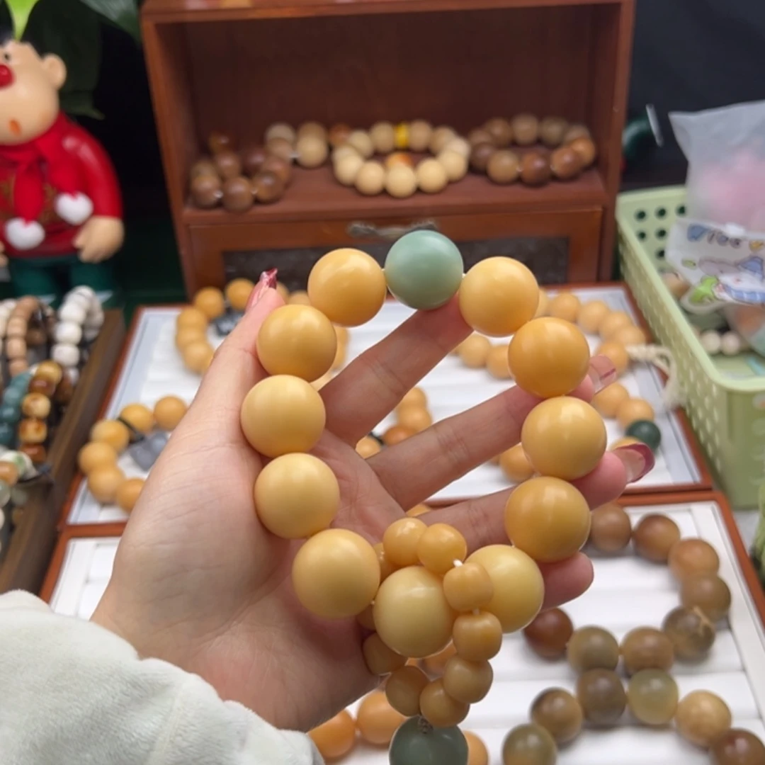 菩提根/象牙果手串晴****n卡22圆珠干磨手持微微瑕