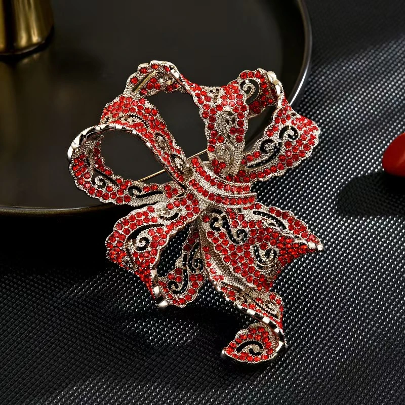 1583红色镂空丝带结大衣胸针