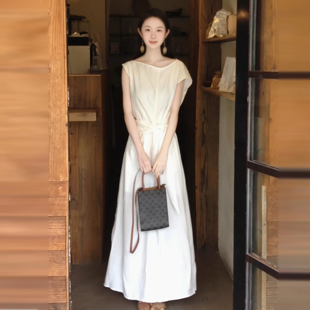 法式气质白色连衣裙子女夏季2025新款海边度假收腰显瘦长裙4275