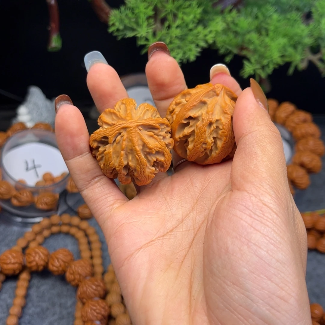 岳***梅手串桃核桃核核桃