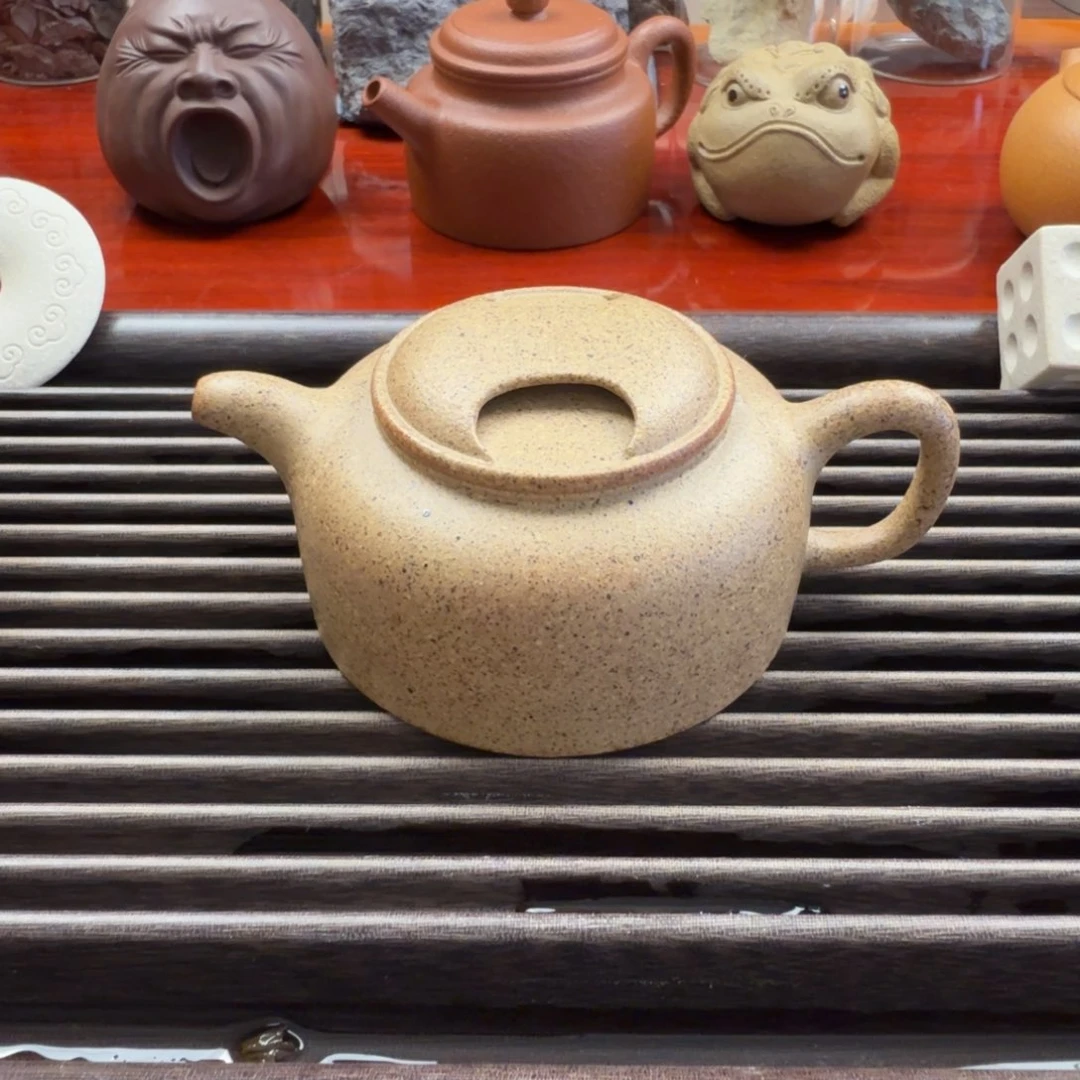 瑕，黄段牛盖莲子，容量一百四