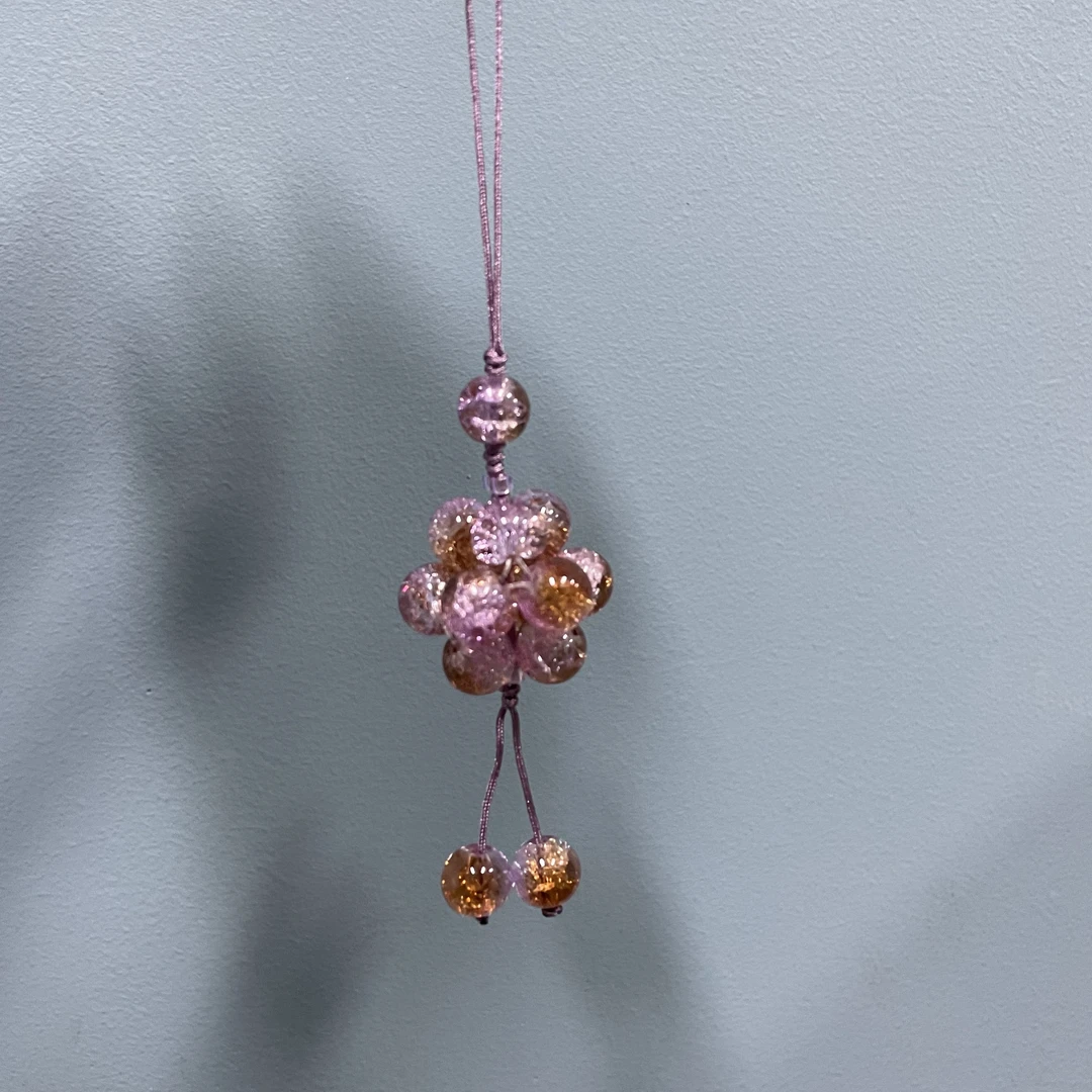 绳款紫咖色玲珑球手机坠E21