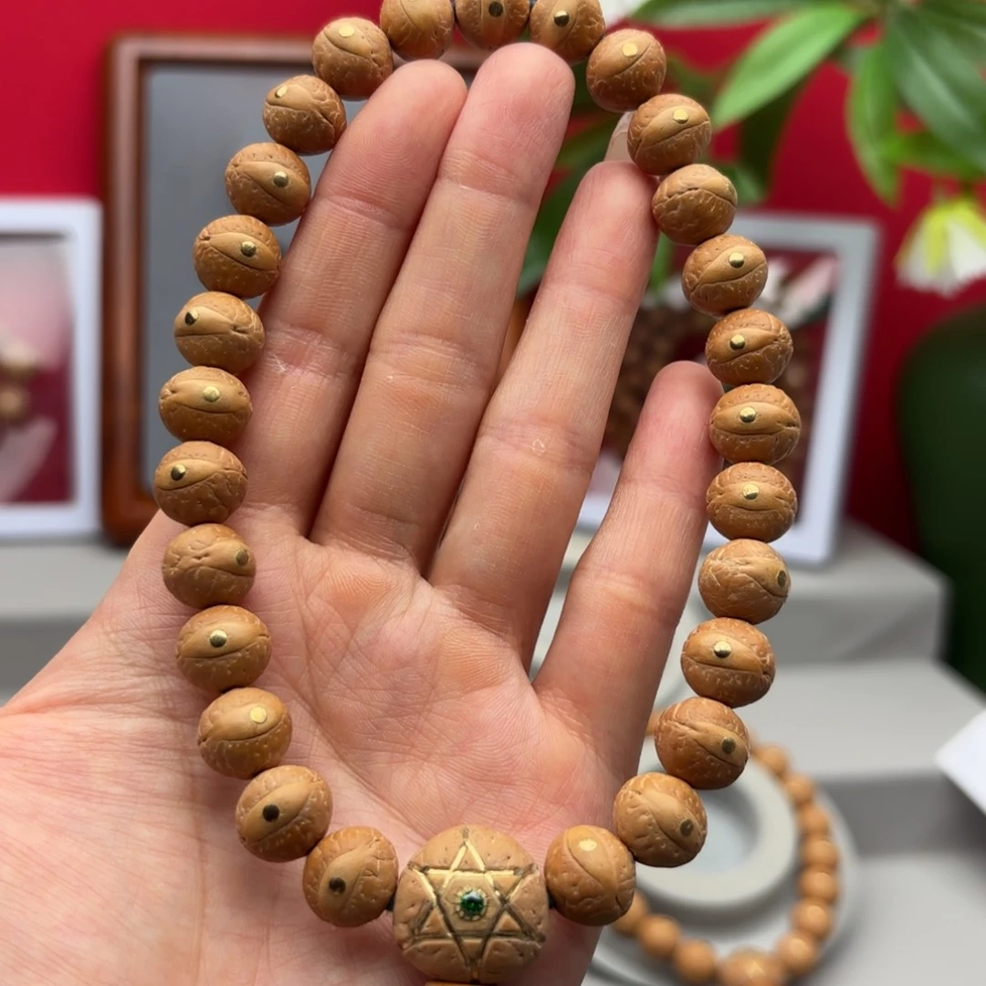 凤眼菩提手串b****411.5铜钉手持