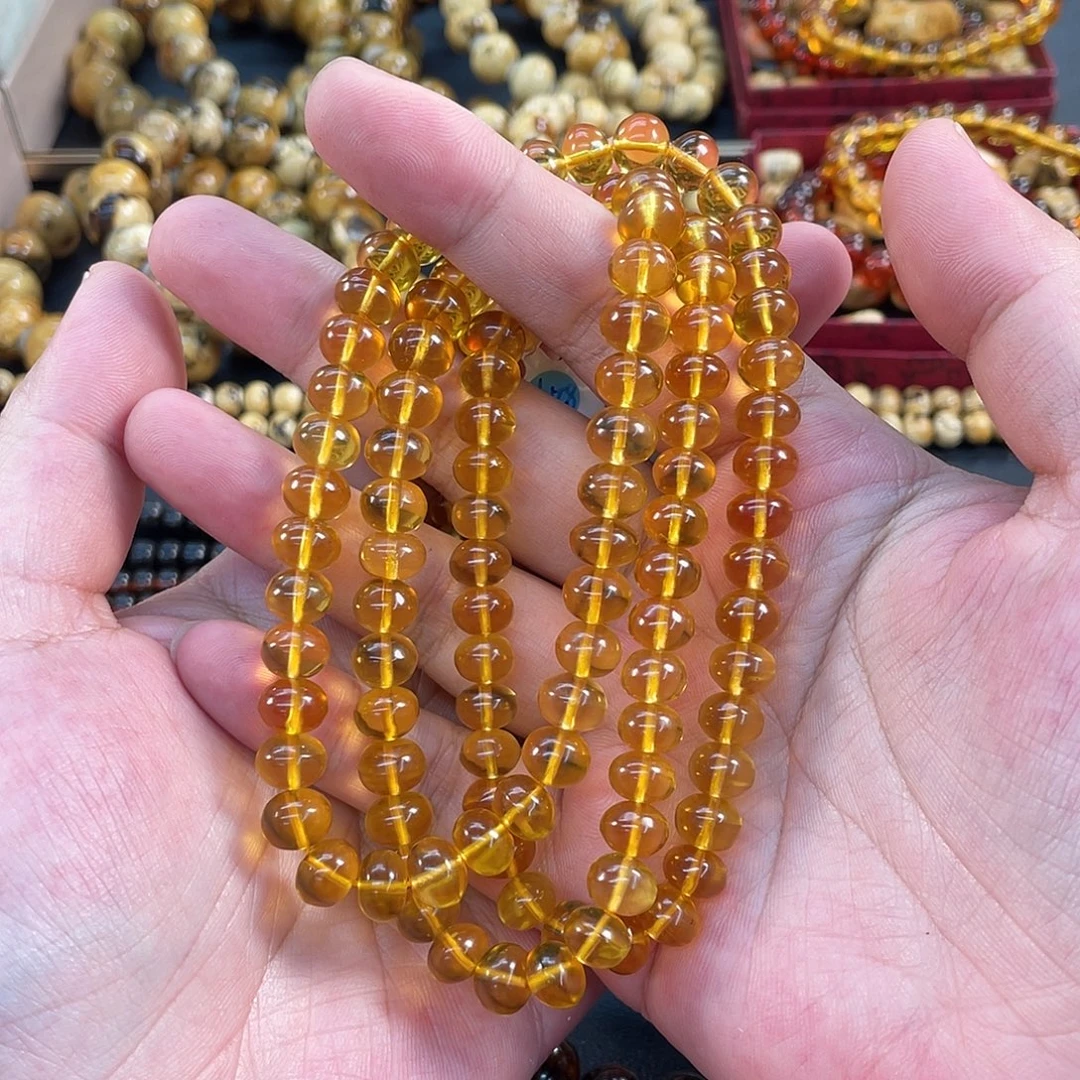 小***一琥珀未镶嵌裸石8mm金珀