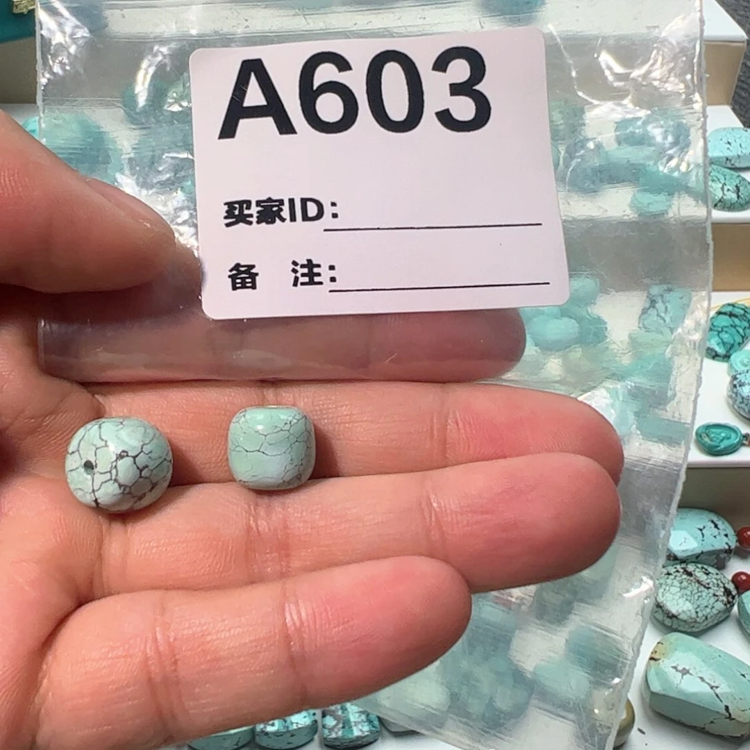 绿松石一对老型未镶嵌牛****律