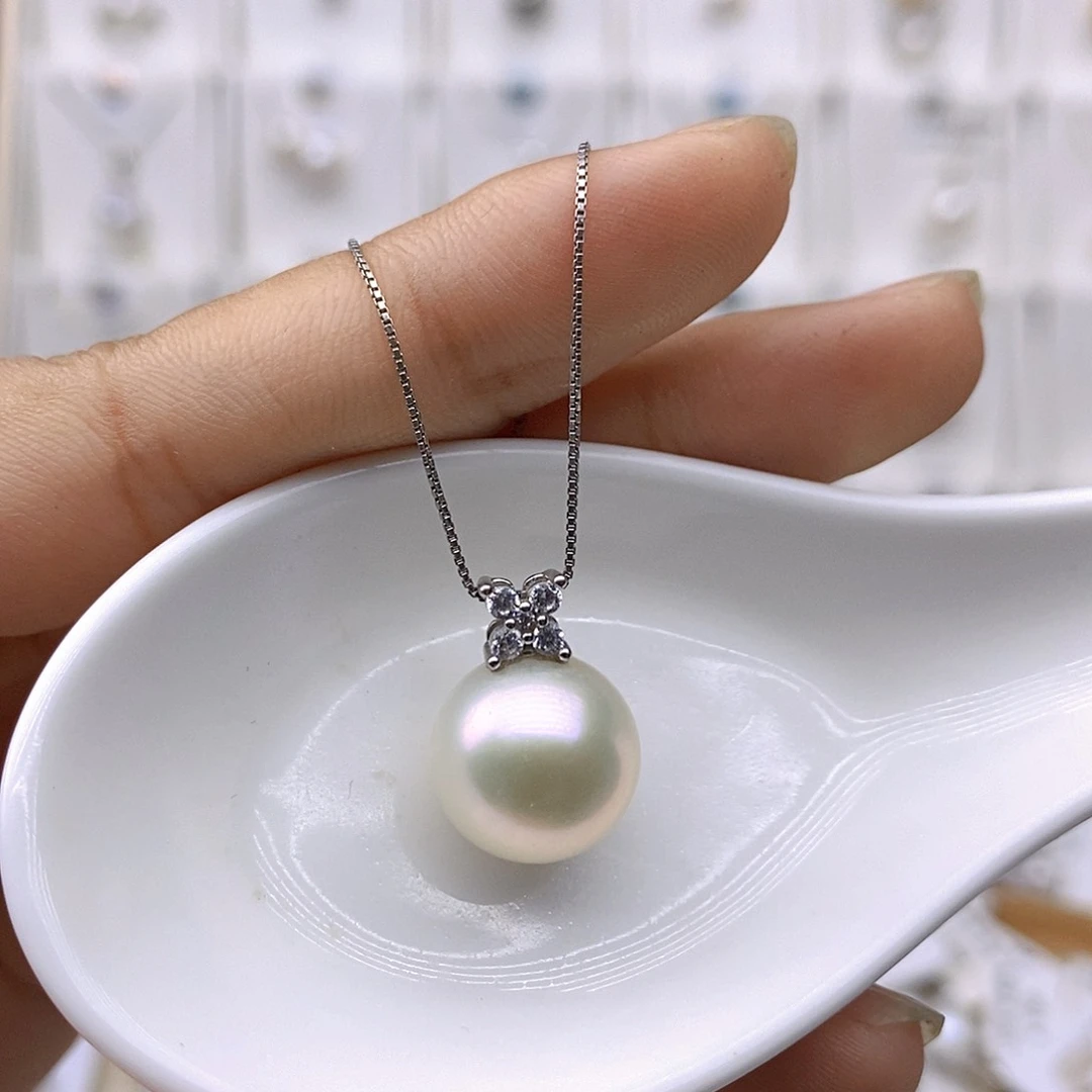 淡水珍珠银S925镶嵌吊坠(赠链)鹏**书
