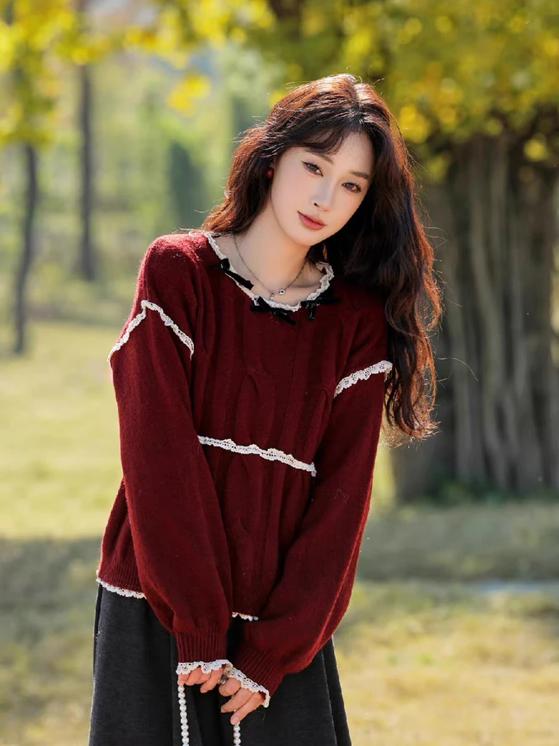 韩版新款蝴蝶结蕾丝拼接毛衣