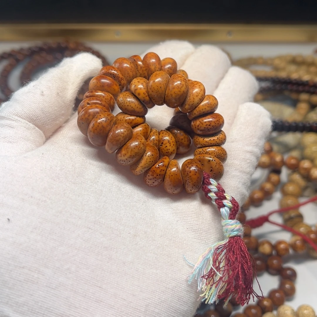 星月菩提吊坠13陈籽大肠手持