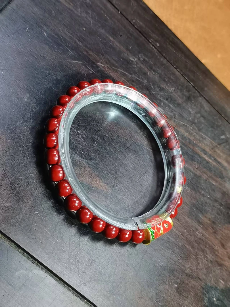 含辰砂工艺品C240辰砂0.6配年年有鱼单圈手串合成