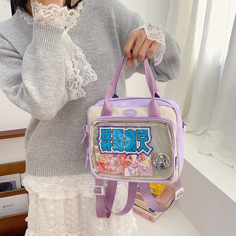 糖果色大食量痛包斜挎双肩背包手提可爱包包女帆布包新款补习书袋