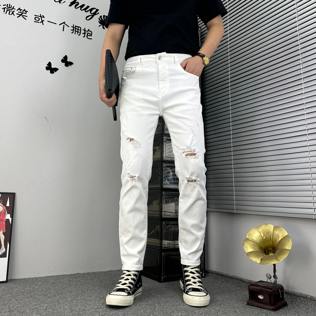 男士夏季新款水洗破洞高弹力时尚百搭白色个性修身九分牛仔裤韩版