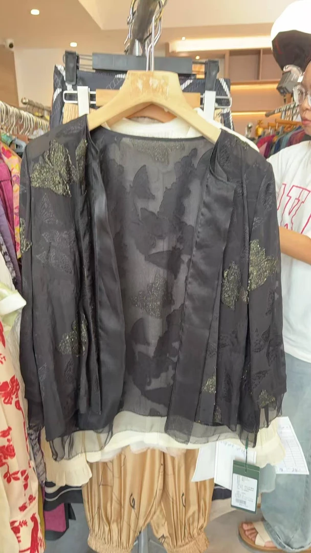 品牌新款简约通勤时尚百搭镂空长袖外套526152