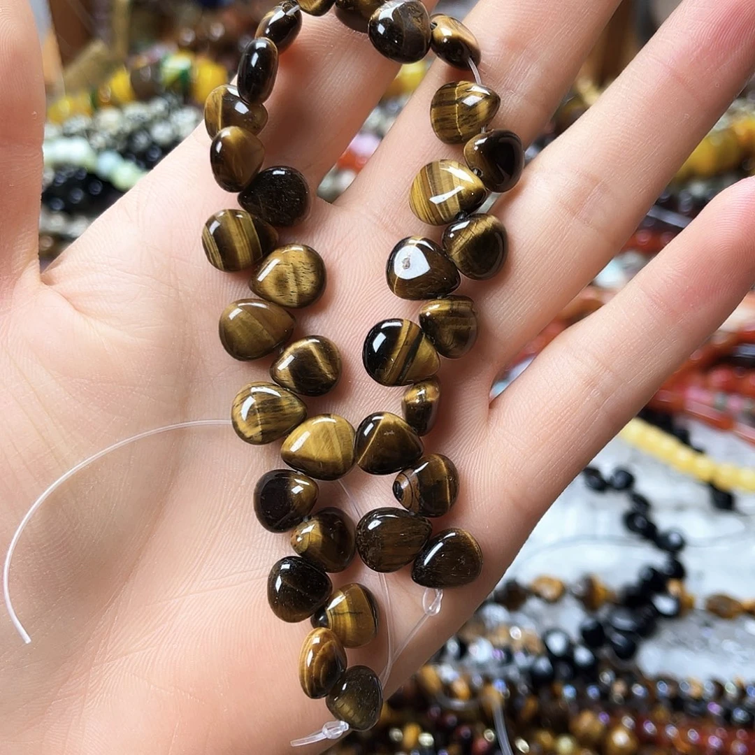 玛瑙/玉髓未镶嵌珠宝半成品10×12黄虎水滴一条