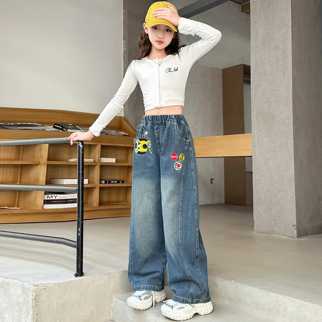 女童牛仔弯刀裤春秋季新款2025爆款卡通刺绣女孩6-12潮款儿童裤子