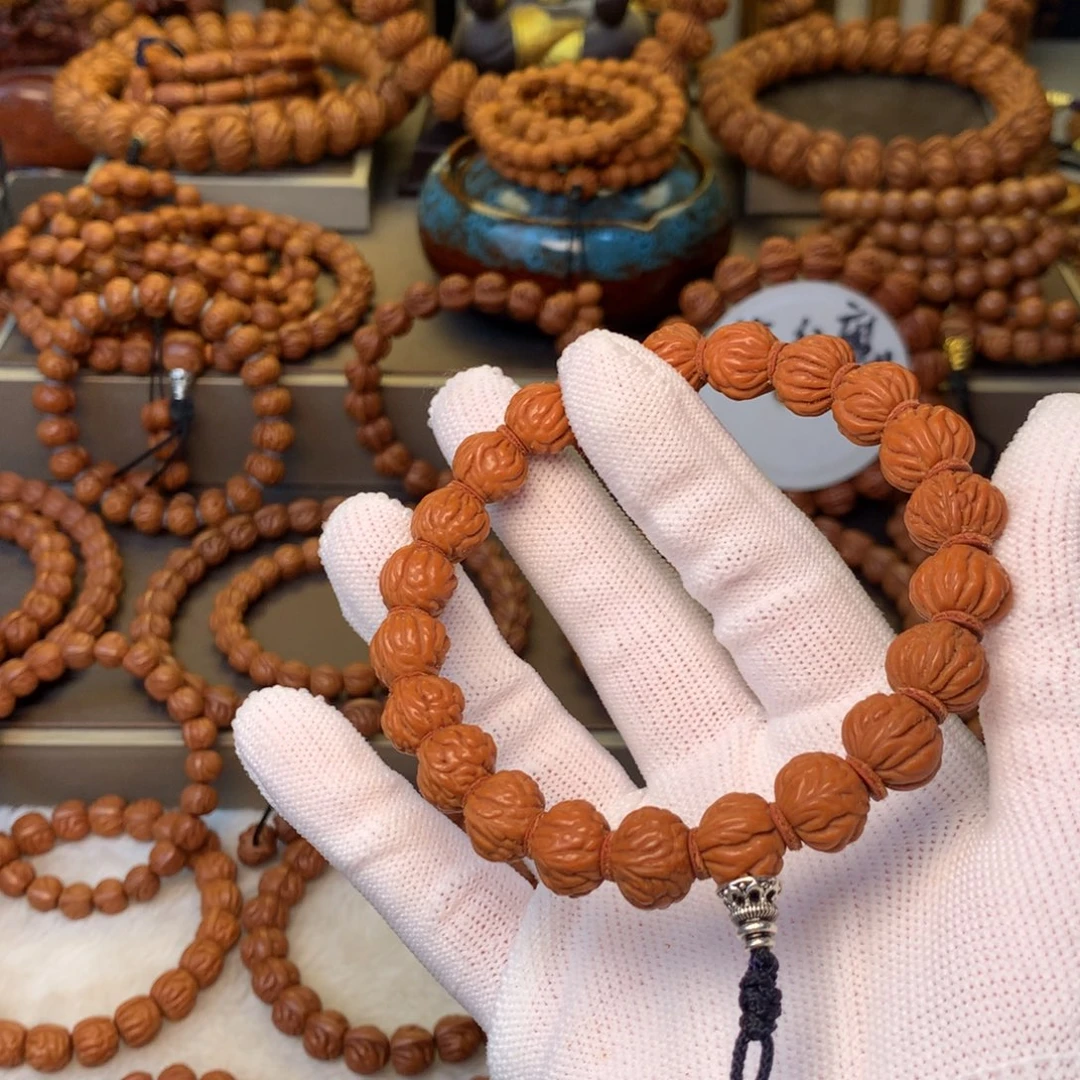 敬***1桃核手串秦岭龙纹