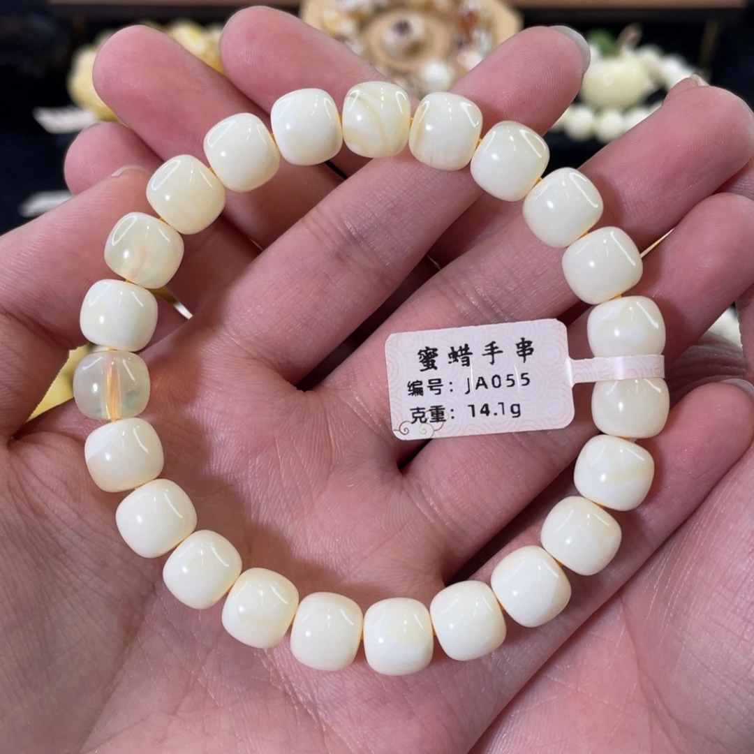 琥珀未镶嵌裸石10mm同料瓷白拉丝荧光老型手串