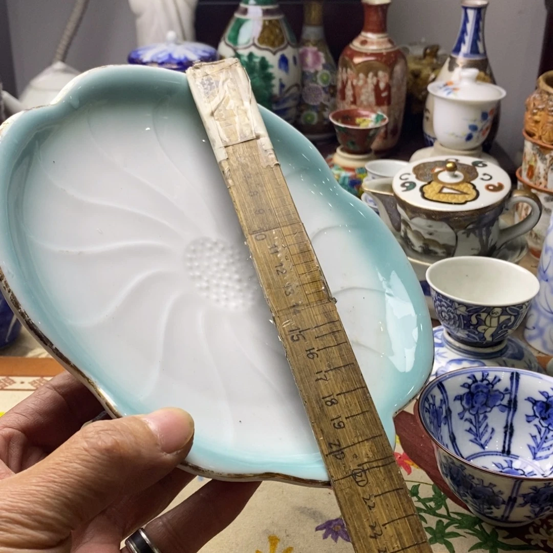 瓷片是的呀哈哈是这样哈哈好开心