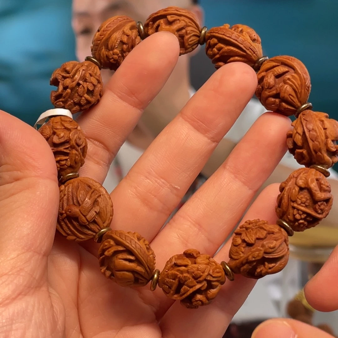 龙纹桃核民俗风格十二生肖核雕作品