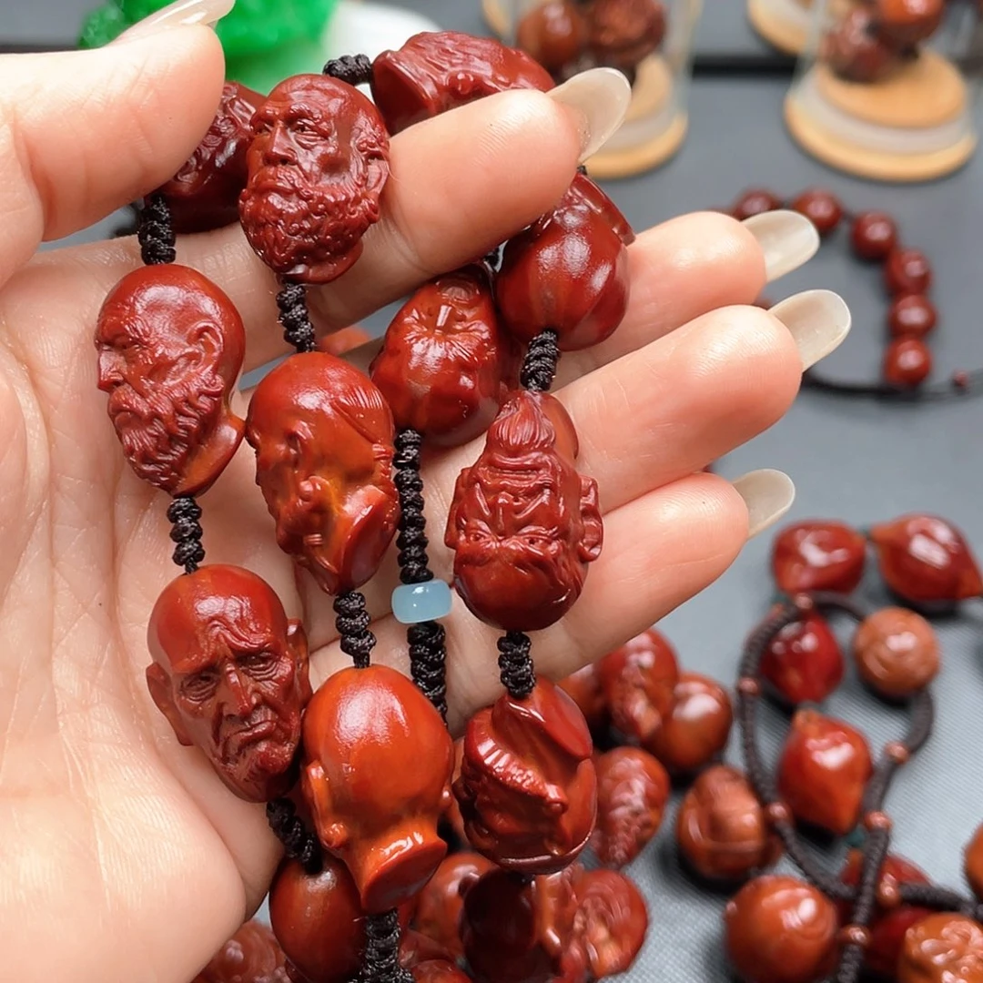 一***幻橄榄核手串十八罗汉