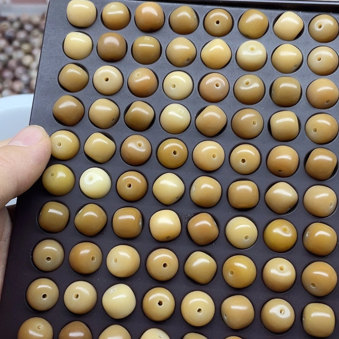 善***己白玉菩提吊坠12.4精品风化桶100颗