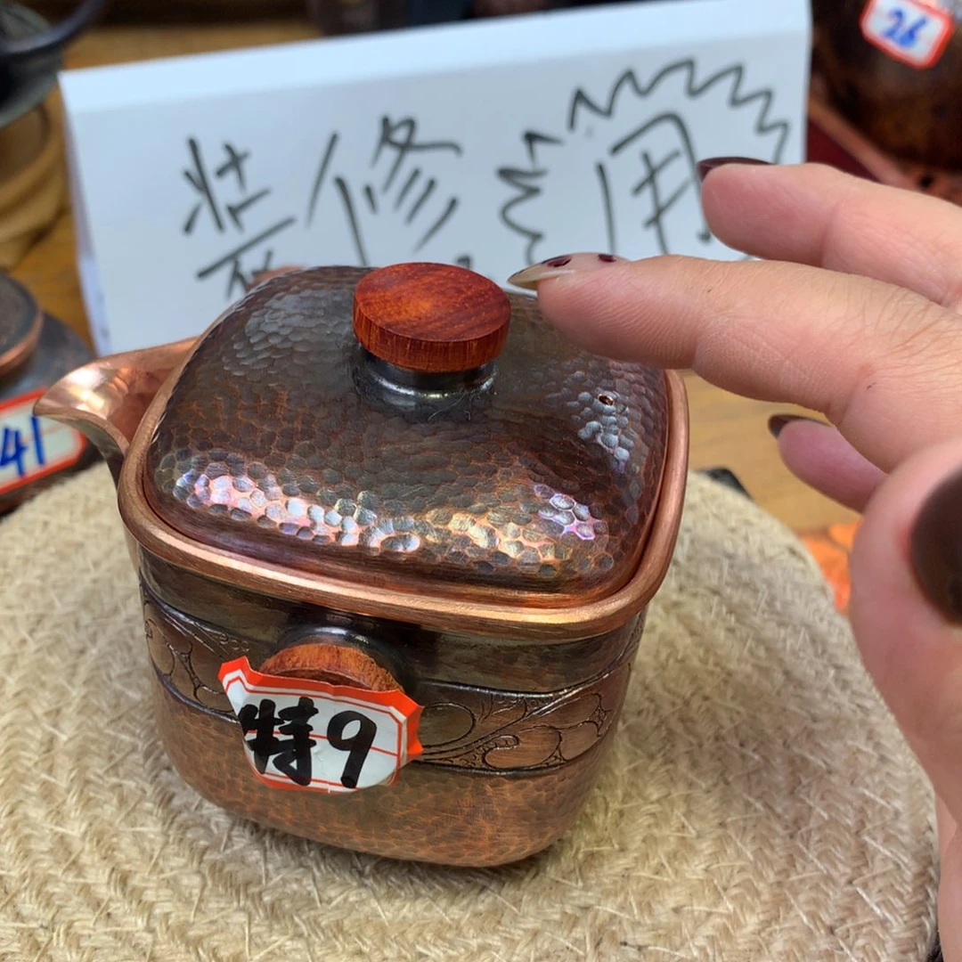 四方精工錾刻手抓壶