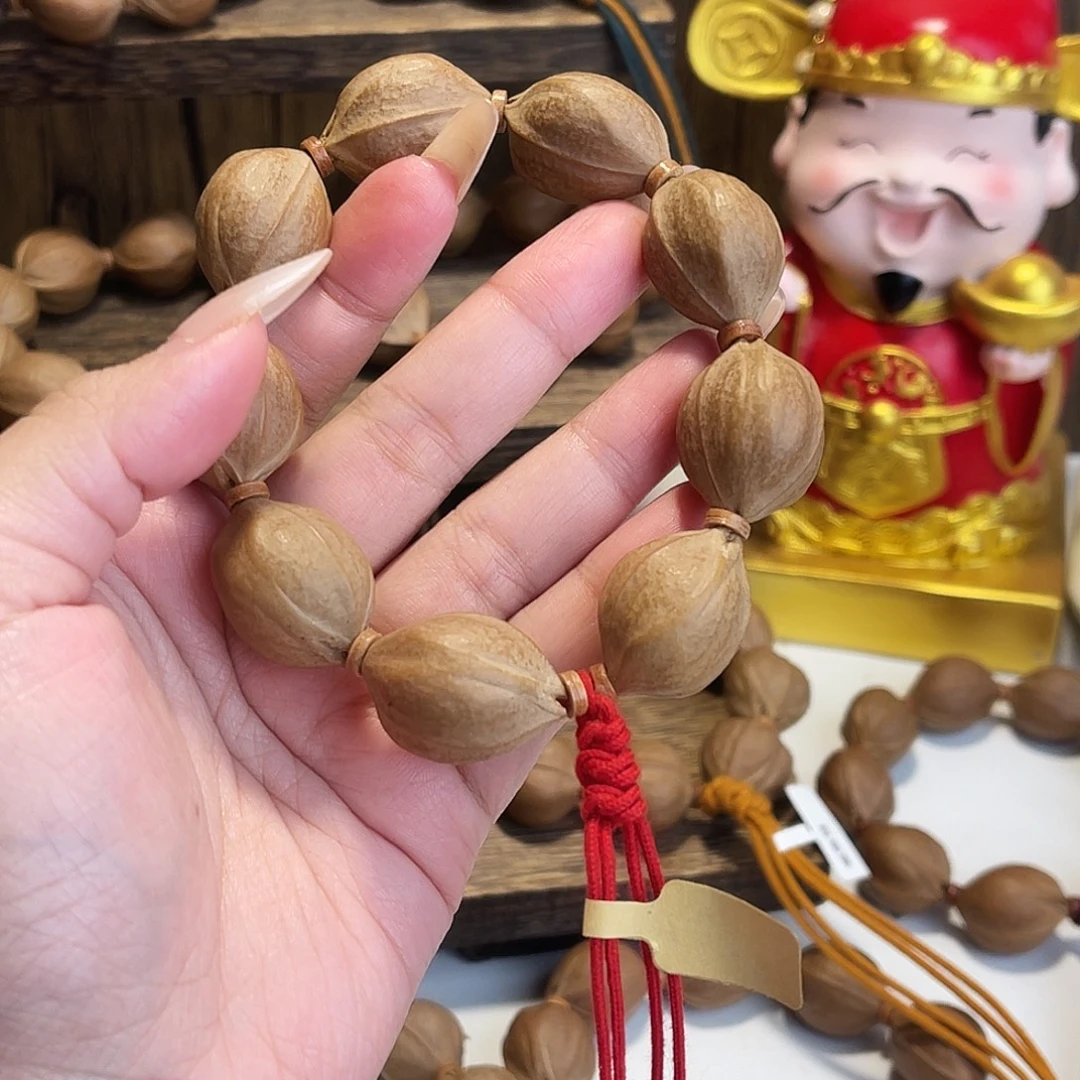 王***拿橄榄核手串/手链梅林