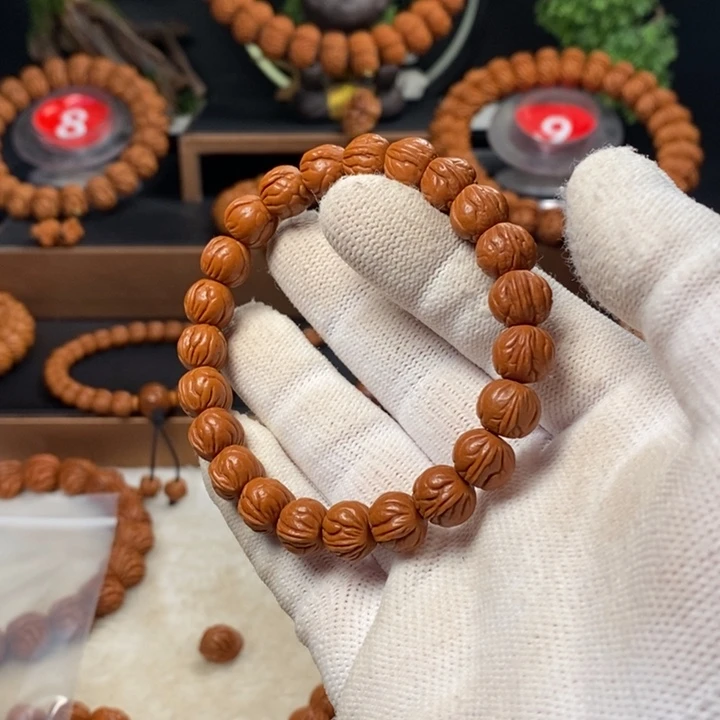 桃核吊坠达***琪秦岭龙龙纹桃核