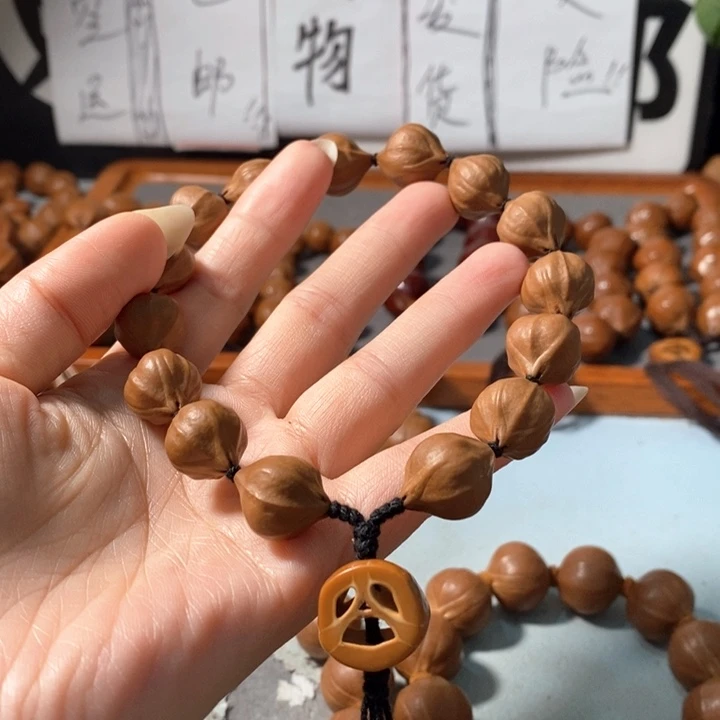 橄榄核手串14*17精品4花蒜头小铁核14+1颗