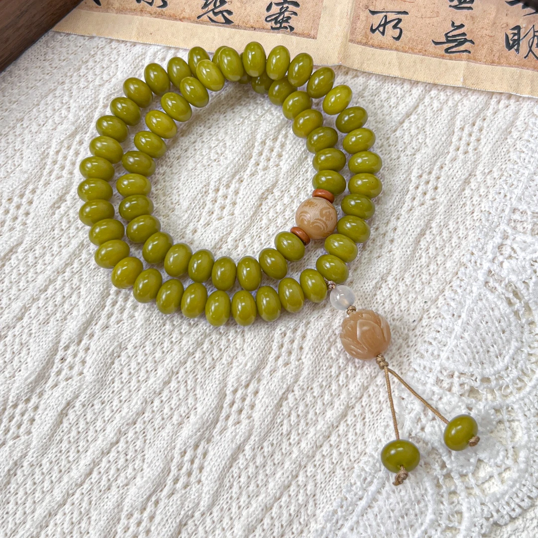 牛油果绿算盘珠柯媛菩提双圈9*6mm   S-C207115