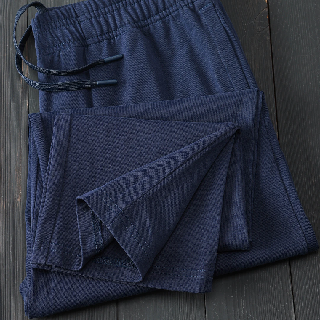 蓝色全棉轻薄透气柔软亲肤不缩水直筒裤2025秋季纯色简约男女长裤