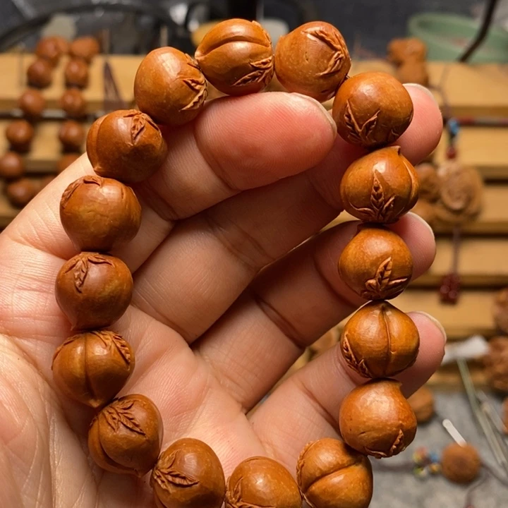 嘉***福桃核手工雕刻寿桃手串