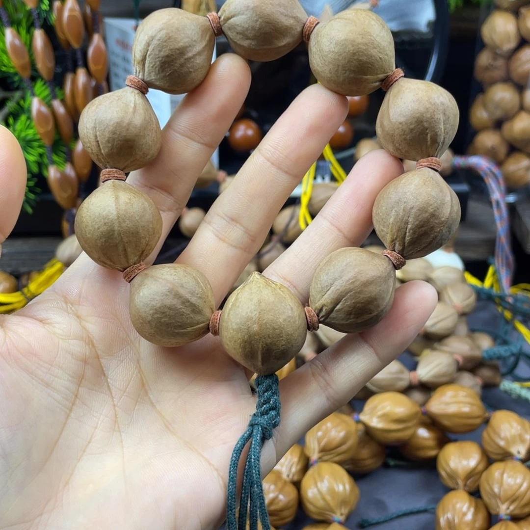 顶***见吊坠橄榄核005.23x26老料正圆