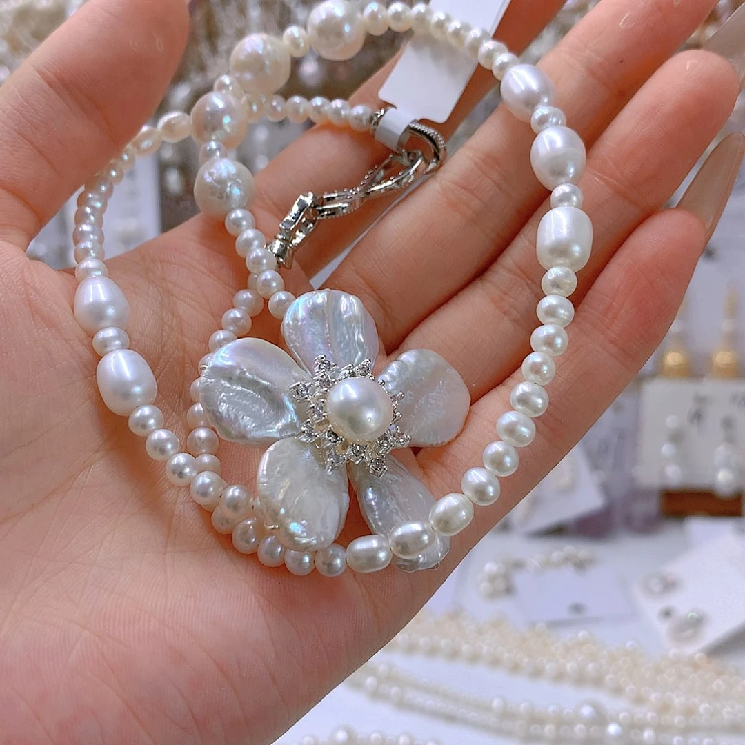 银S925镶嵌淡水珍珠发饰元****?