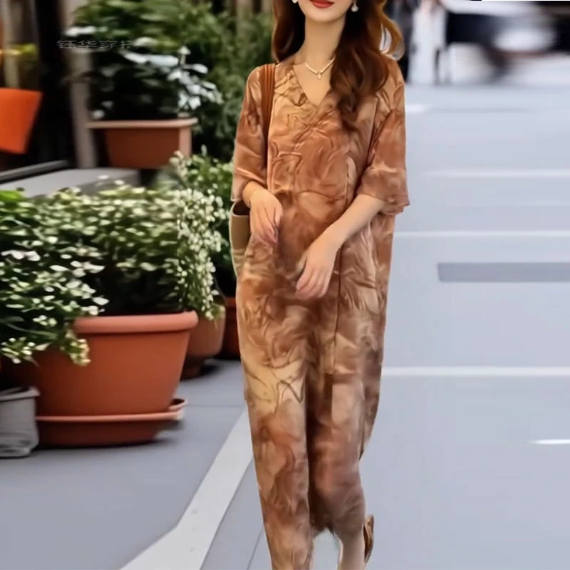 多巴胺风度假印花连衣裙女2025夏季新款长裙宽松时尚高级法式裙子